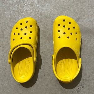 Yellow women’s crocs NWOT